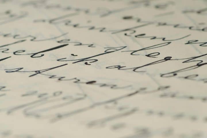 Hand-written words on paper.