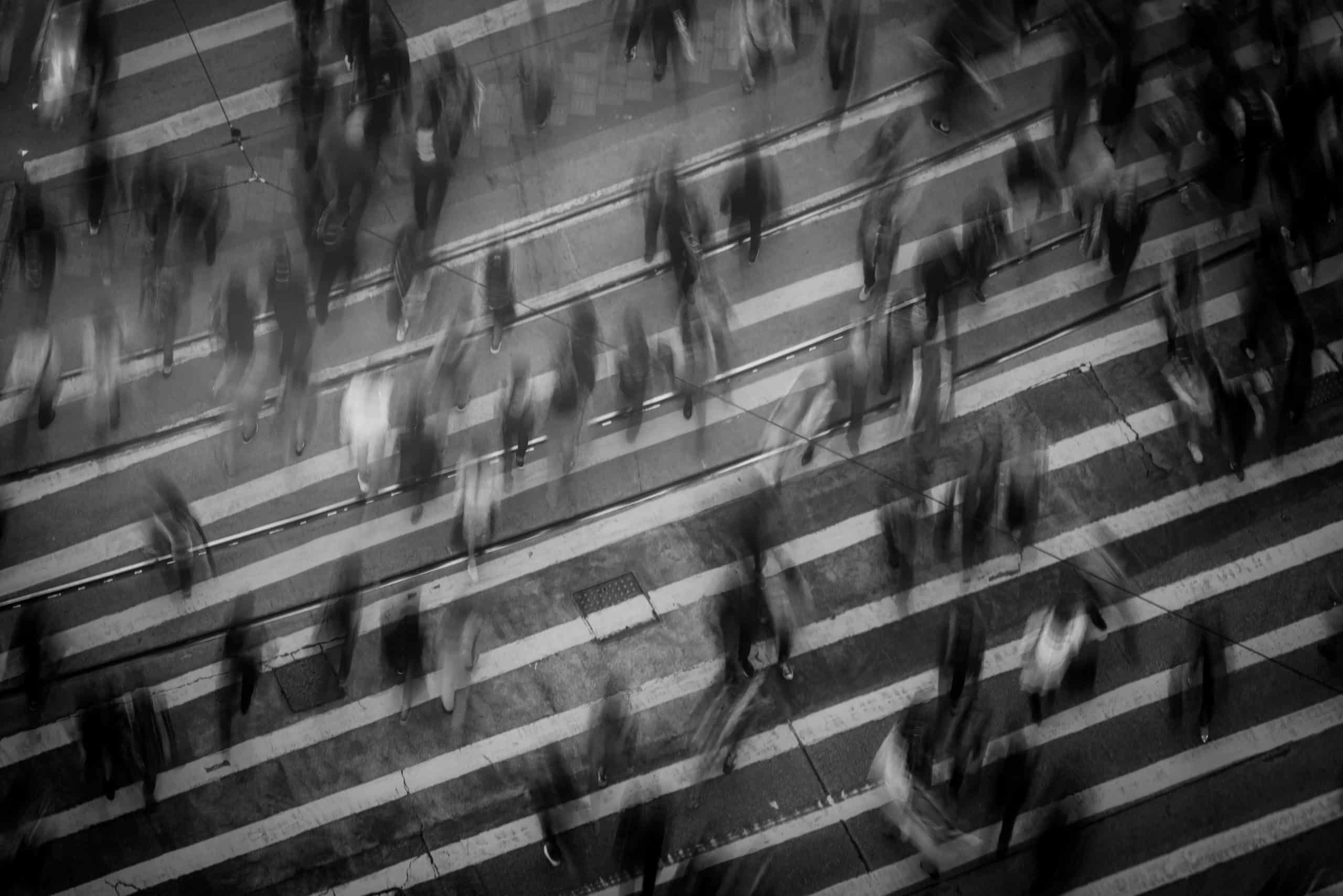 Time Lapse Photography of People Walking on Pedestrian Lane.