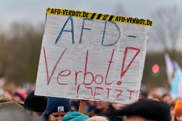 A sign at a protest, reading "AFD-Verbot! Jetzt!" meaning "Ban the AfD now!"