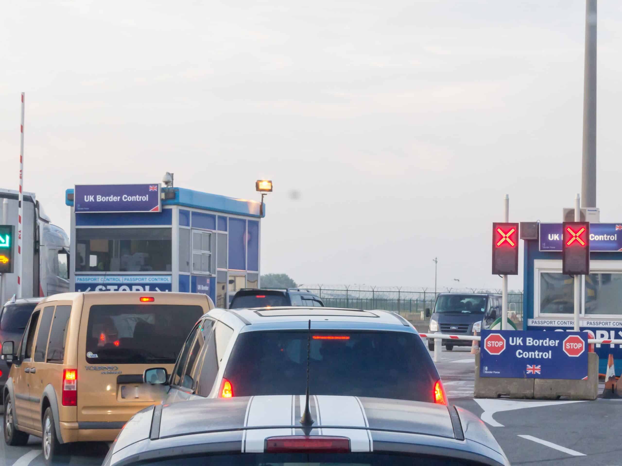 Cars queuing in front of the British border control area in Dunkerque.